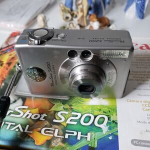 Cannon PowerShot S200 Digital Elph Camera Silver Tested Working Battery Charger